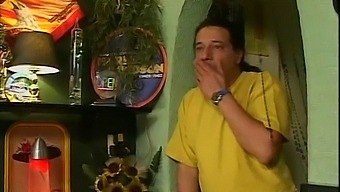 A Blonde Woman Enjoys Double Penetration In A Bar
